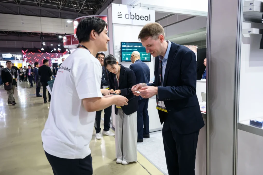 Exchanging business cards at the abbeal booth in the Pavillon France, SusHi Tech Tokyo 2026