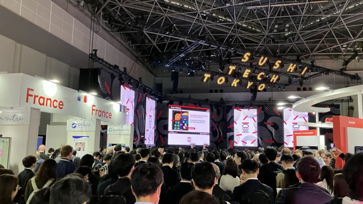 The SusHi Tech Tokyo 2026 exhibition hall with the Pavillon France and a large crowd